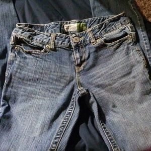 1/2 size straight legged, low rises jeans